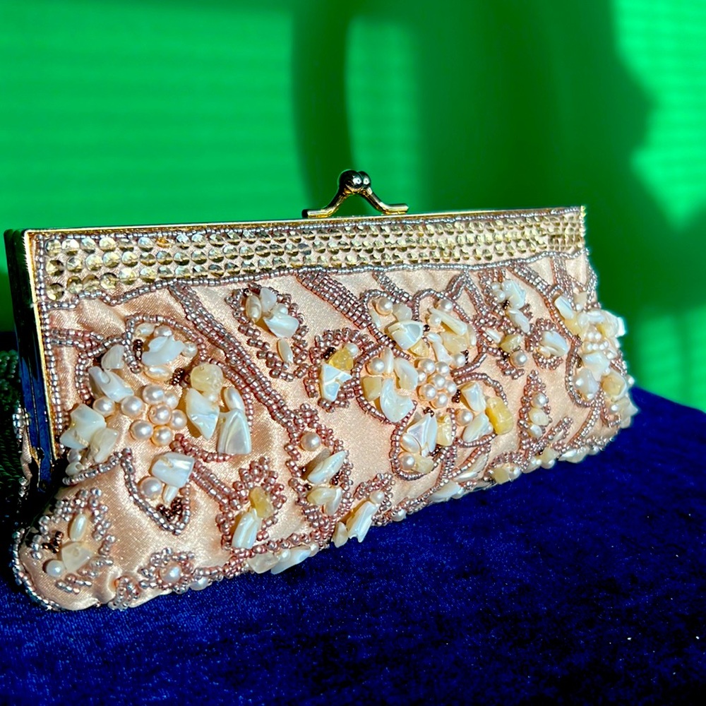 LORD & TAYLOR clutch. Mother of Pearl & pearl with gold beading, satin lining.